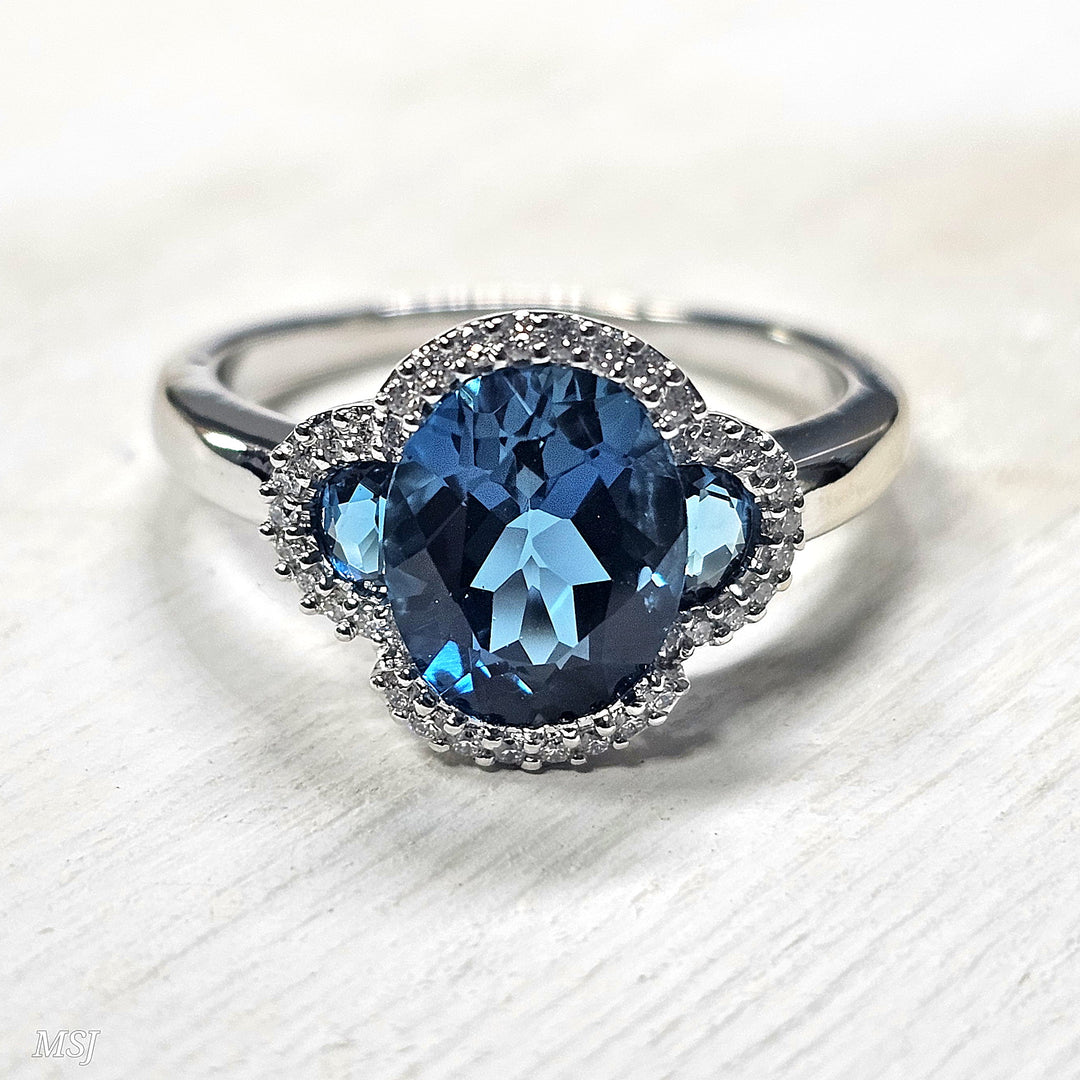 14k White Gold 3.04 Ctw Blue Topaz and 0.16 Ctw Diamond Ring