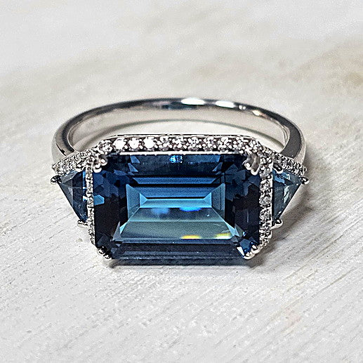 14k White Gold 4.60 Ctw Blue Topaz and 0.22 Ctw Diamond East to West Ring