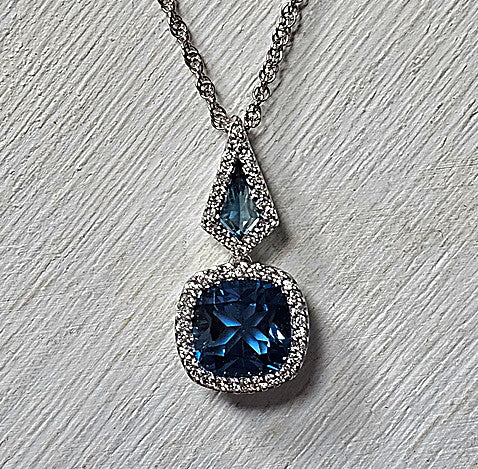 14k White Gold 2.24 Ctw Blue Topaz and 0.16 Ctw Diamond Pendant