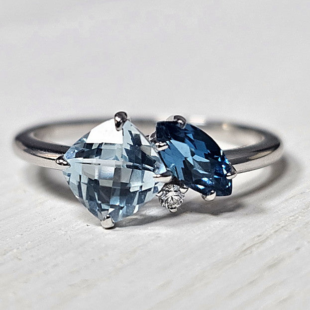 14k White Gold 1.49 tw Blue Topaz and .03 ctw Diamond Ring