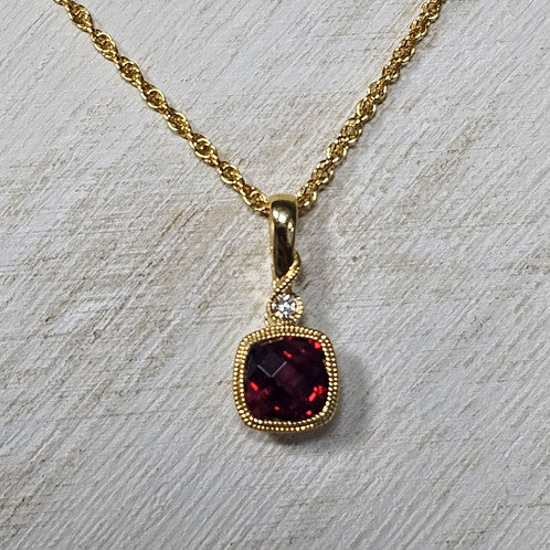 14k Yellow Gold 1.18 Ctw Garnet and 0.02 Ctw Diamond Pendant