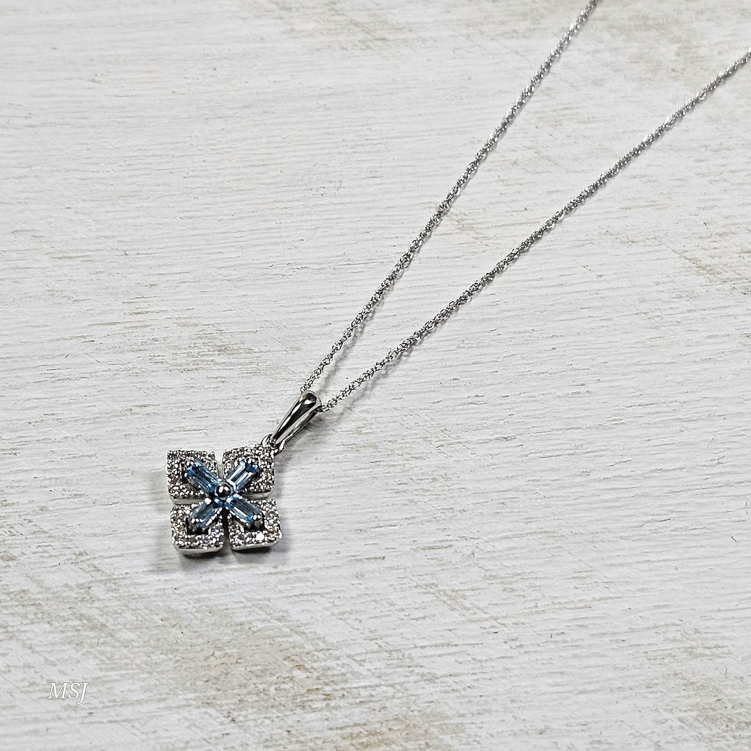 10k White Gold .15ct Blue Topaz and Diamond Pendant