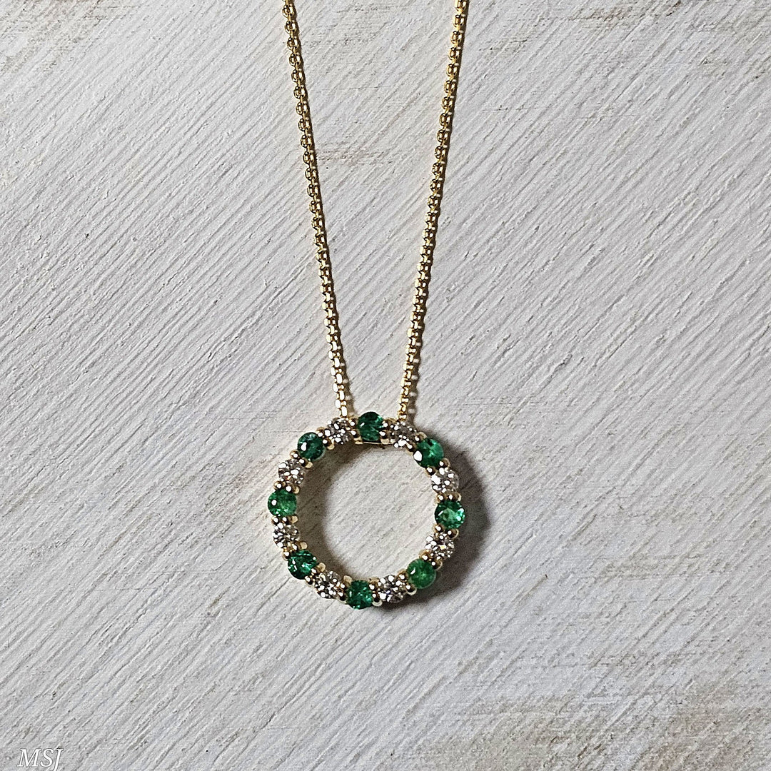 14k Yellow Gold .65ctw Emerald and Diamond Circle Pendant