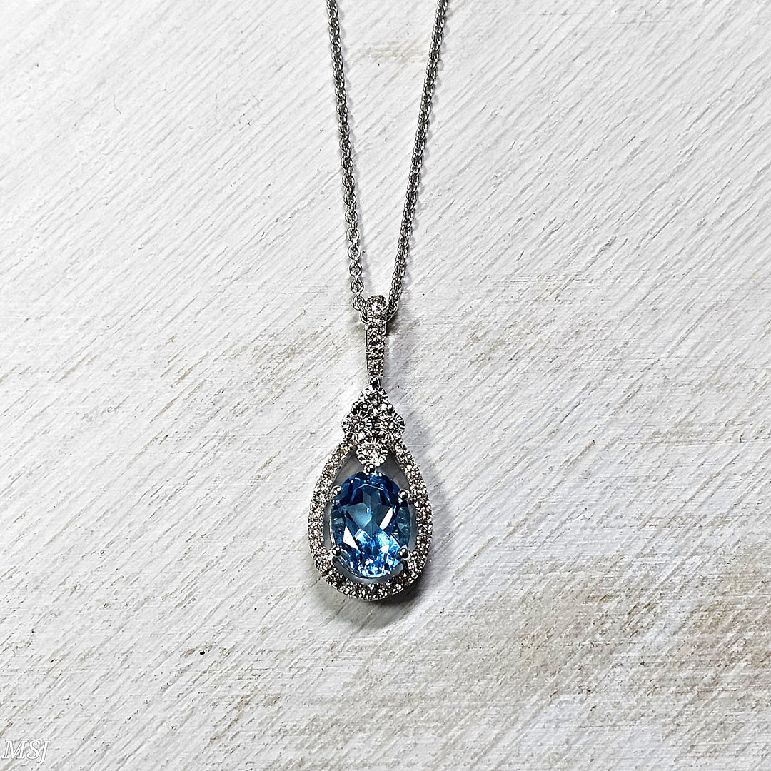 10k White Gold 1.70ctw Blue Topaz and Diamond Pendant