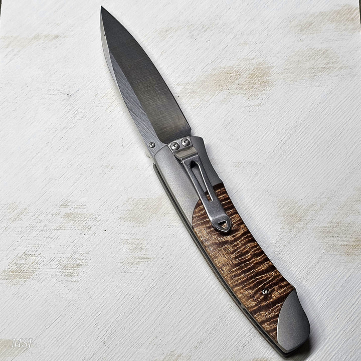 A200-13 Stainless Blade with Titanium Frame inlaid with Koa Bur Wood