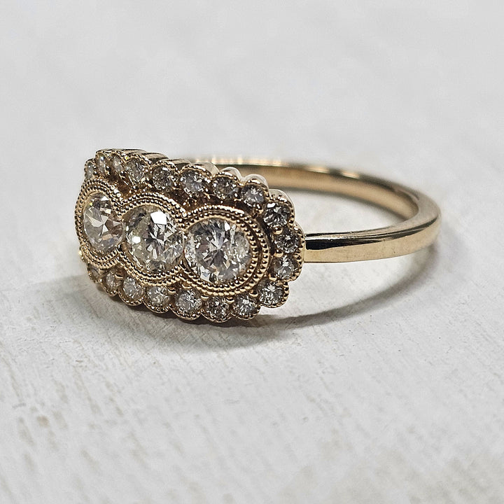 14k Yellow Gold .76ctw 3 Stone Diamond Halo Ring