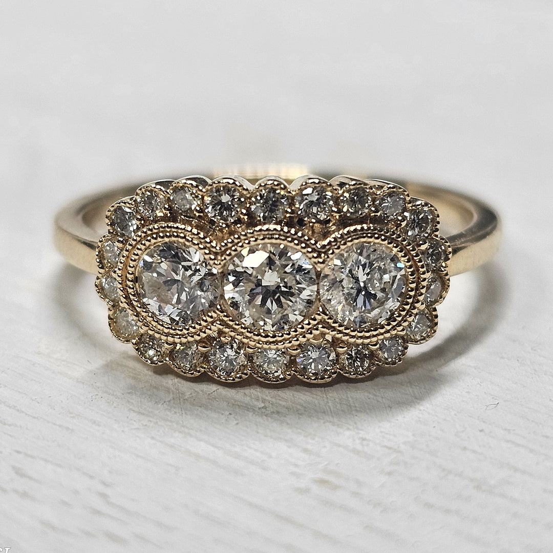 14k Yellow Gold .76ctw 3 Stone Diamond Halo Ring