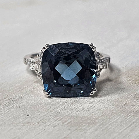 14k White Gold 9.00 Ctw Blue Topaz and 0.25 Ctw Diamond Ring