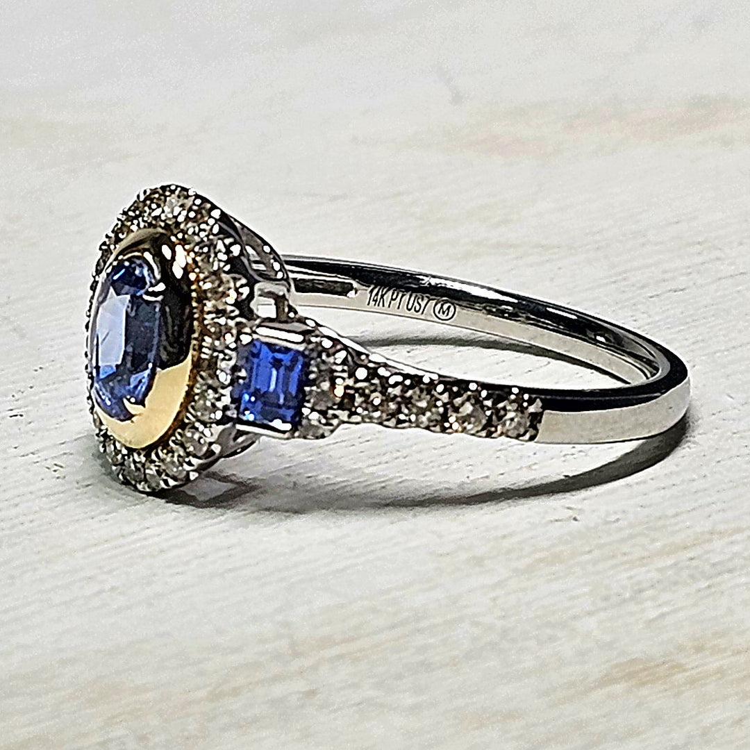 Oval Bezel Set Sapphire with Diamond Halo and Band 14k Yellow Gold Accent