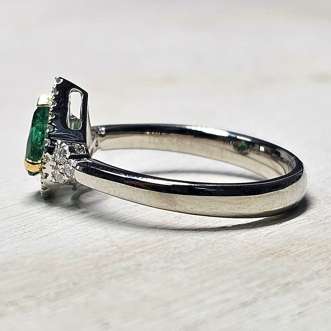 Platinum Two-Tone Pear Shape Emerald And Diamond Halo Ring