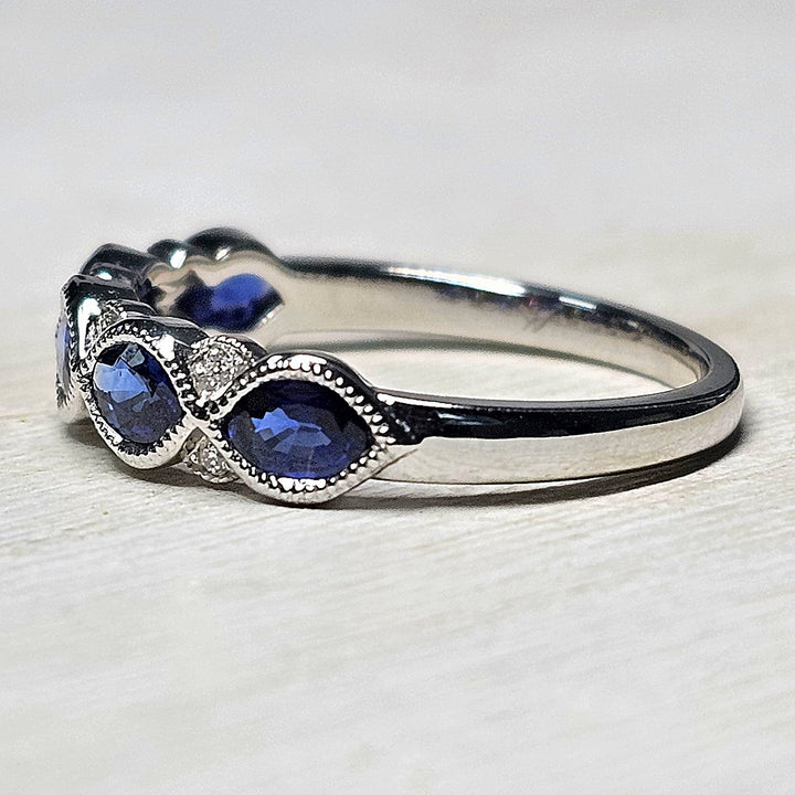 14k White Gold 1.06 Ctw Sapphire and 0.04 Ctw Diamond Band