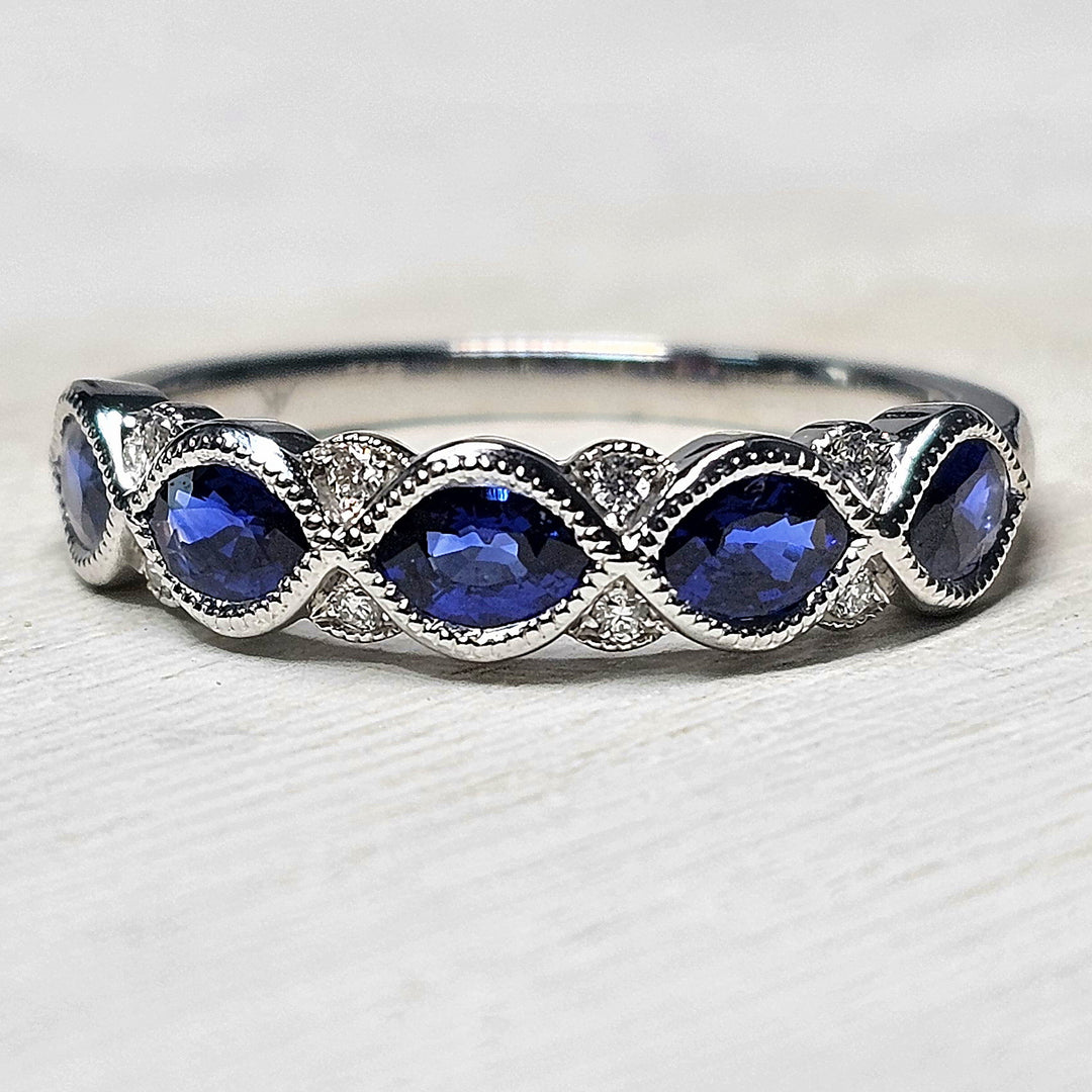14k White Gold 1.06 Ctw Sapphire and 0.04 Ctw Diamond Band