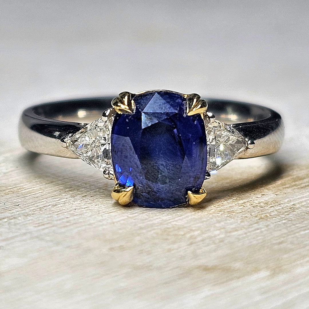 Platinum Two Tone Oval Ceylon Sapphire with Trillion Diamonds Ring