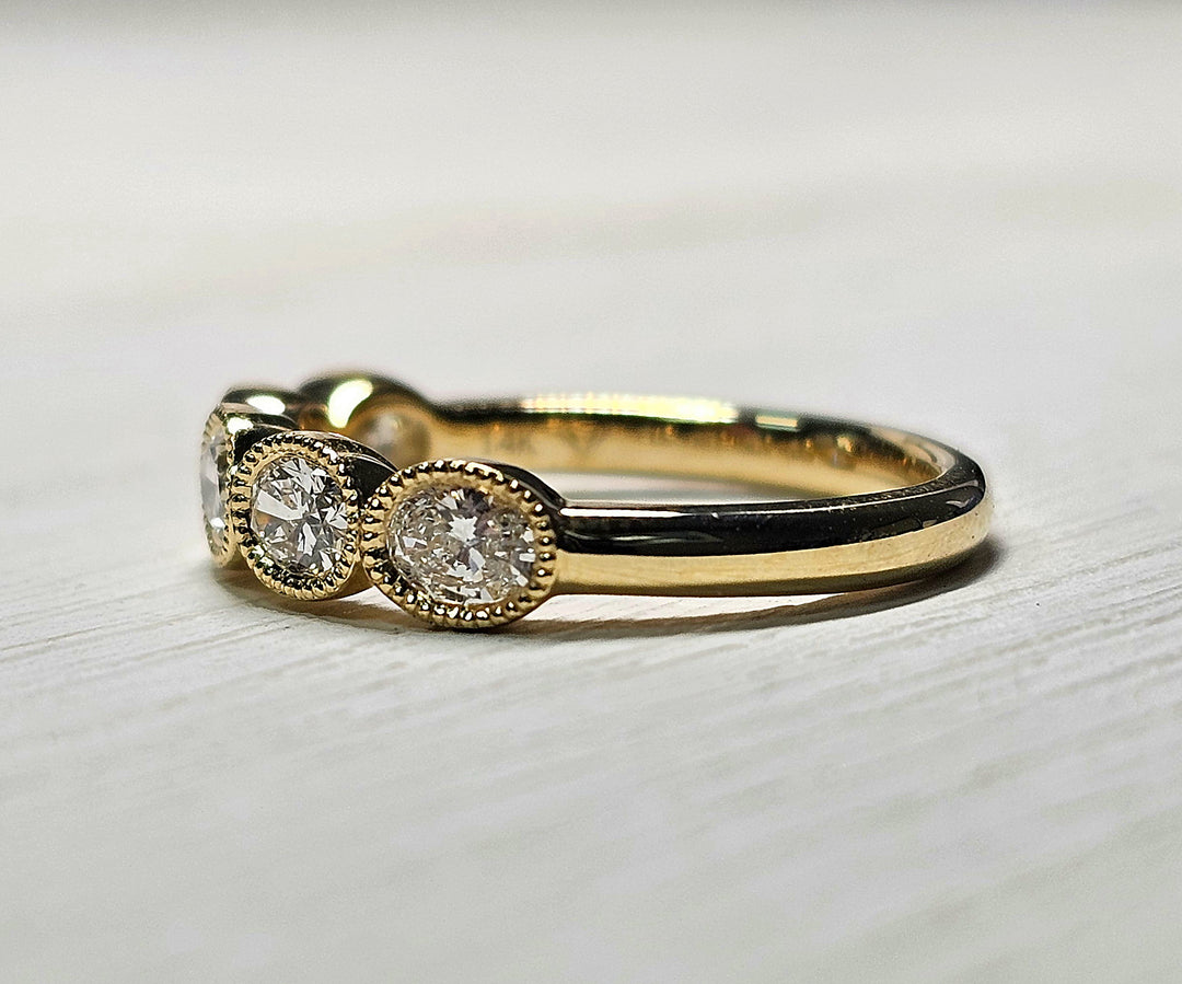 14k Yellow Gold Oval East West Lab Grown Diamond Band .75ctw