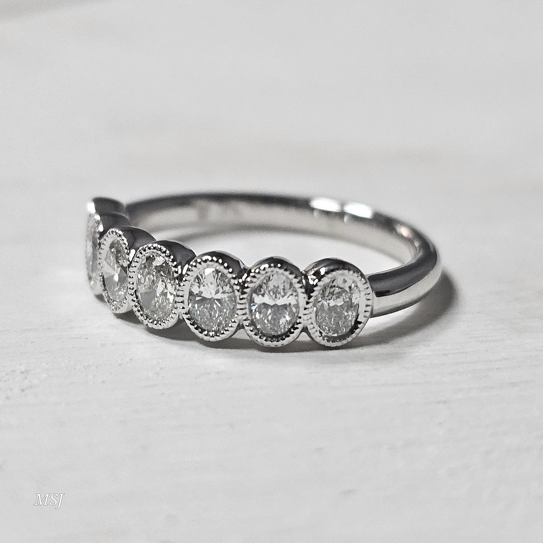 14k White Gold .75ctw Bezel Set Oval Band