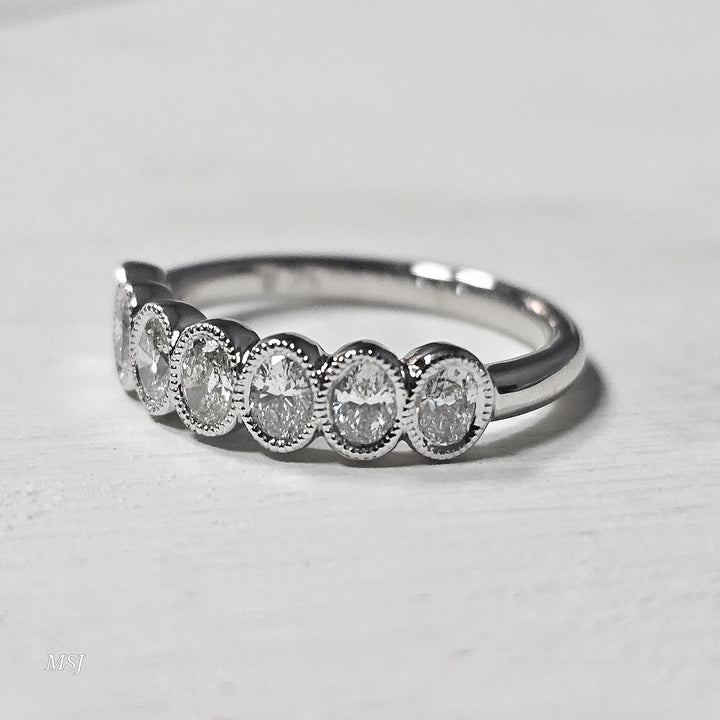 14k White Gold .75ctw Bezel Set Oval Band