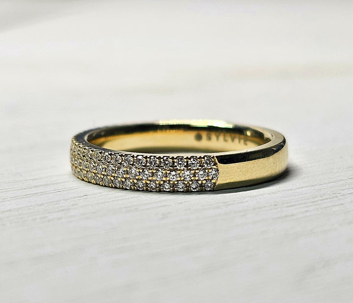 .48 TW diamond band with three rows of pave set diamonds