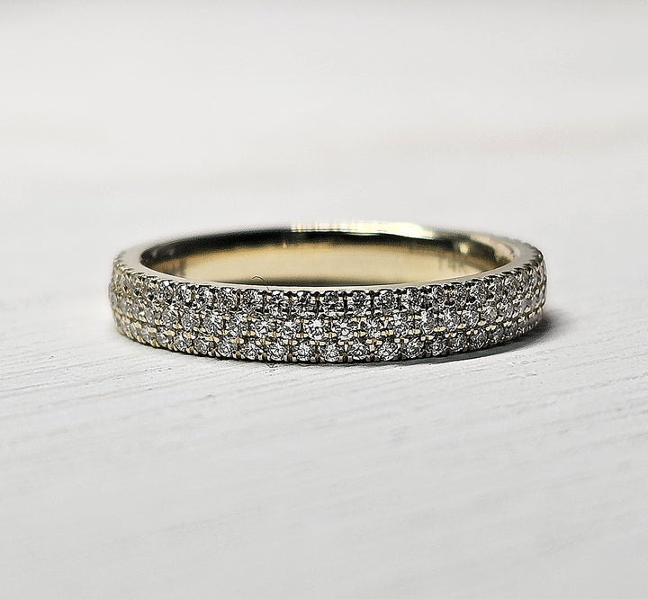 .48 TW diamond band with three rows of pave set diamonds