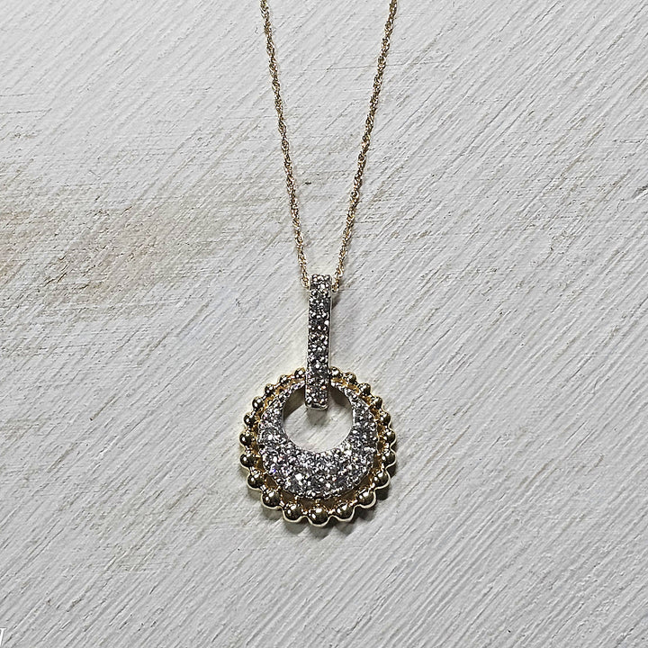 10k Yellow Gold .50ctw Diamond Circle Pendant