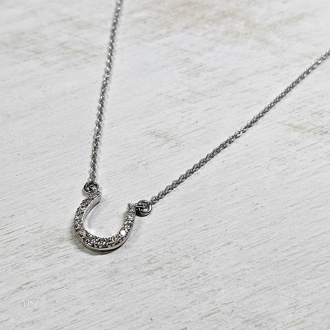 10k White Gold .13ctw Horseshoe Pendant