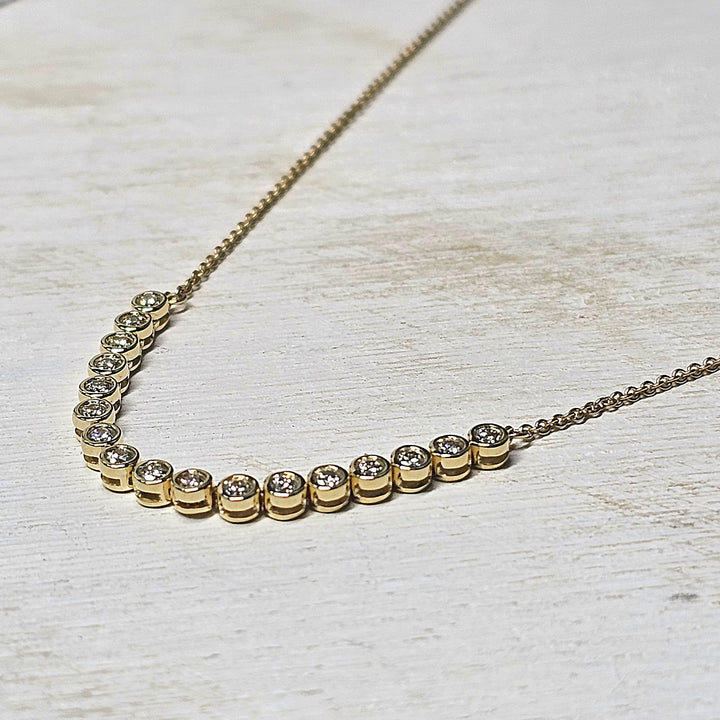 14k Yellow Gold .50ctw Bezel Set Round Diamond Necklace