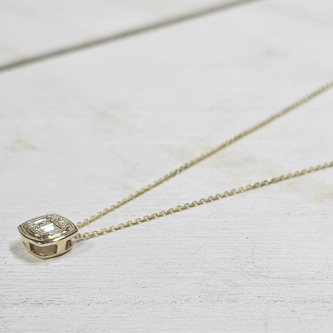 14k Yellow Gold Baguette and Round Diamond Necklace .13ctw