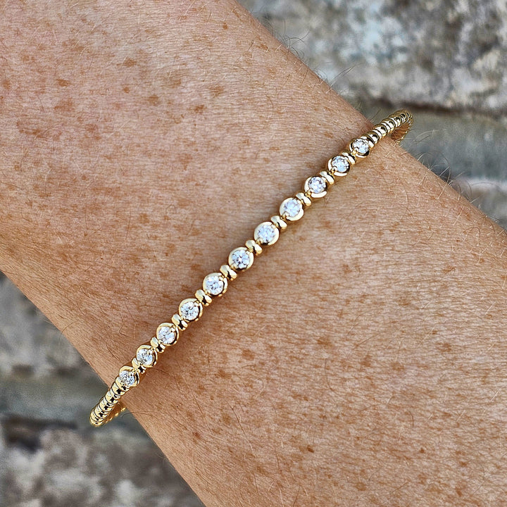 14k Yellow Gold Flex Bangle with Bezel Set Diamonds .44ctw