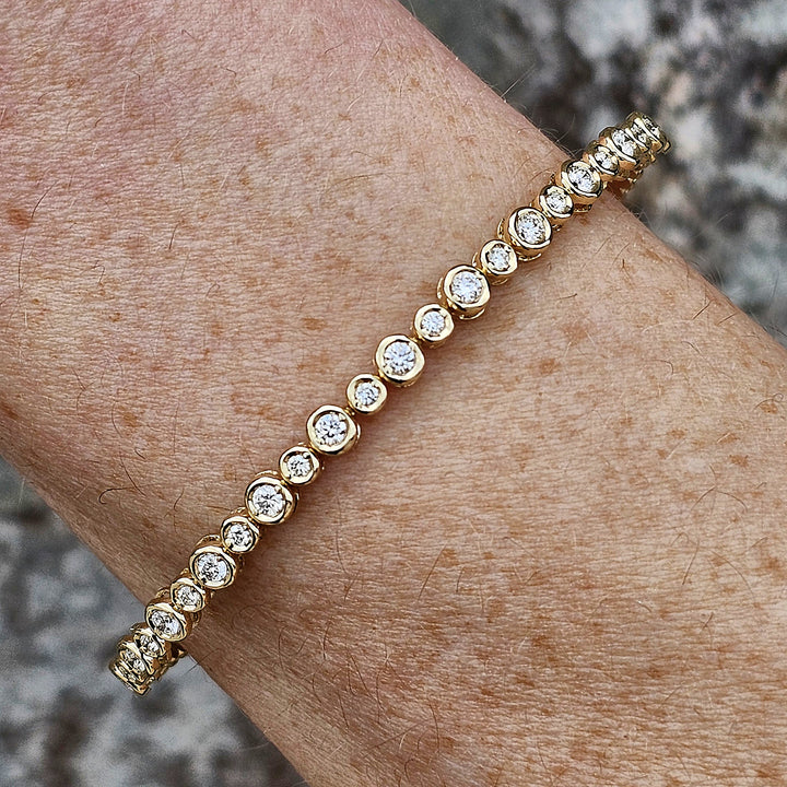14k Yellow Gold Alternating Size Round Diamond Bezel Flex Bangle Bracelet .71ctw