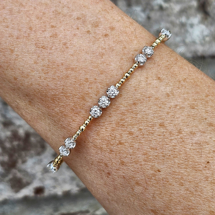 14k Two Tone Beaded Station Diamond Flex Bangle .56ctw