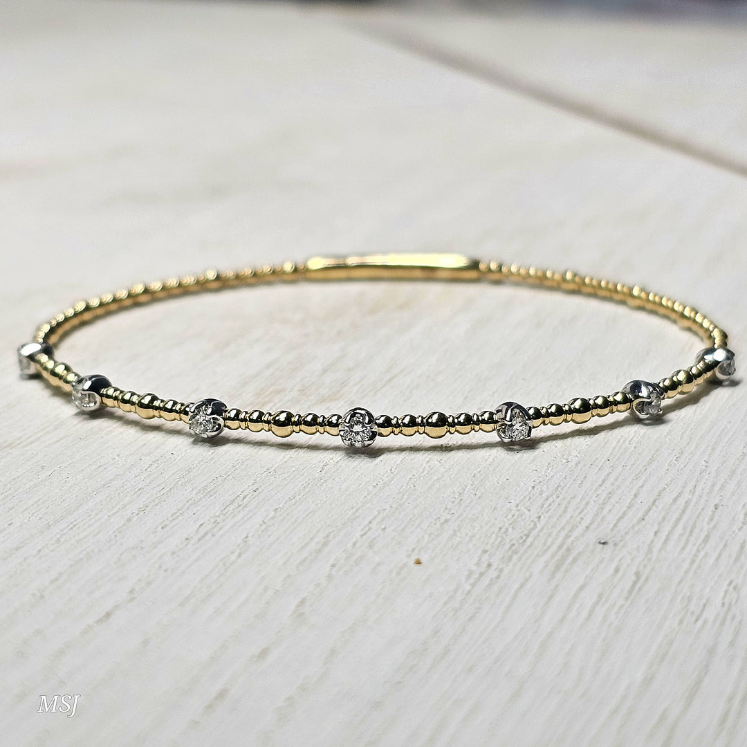 14k Two Tone 7 Station Diamond Flex Bangle .25ctw