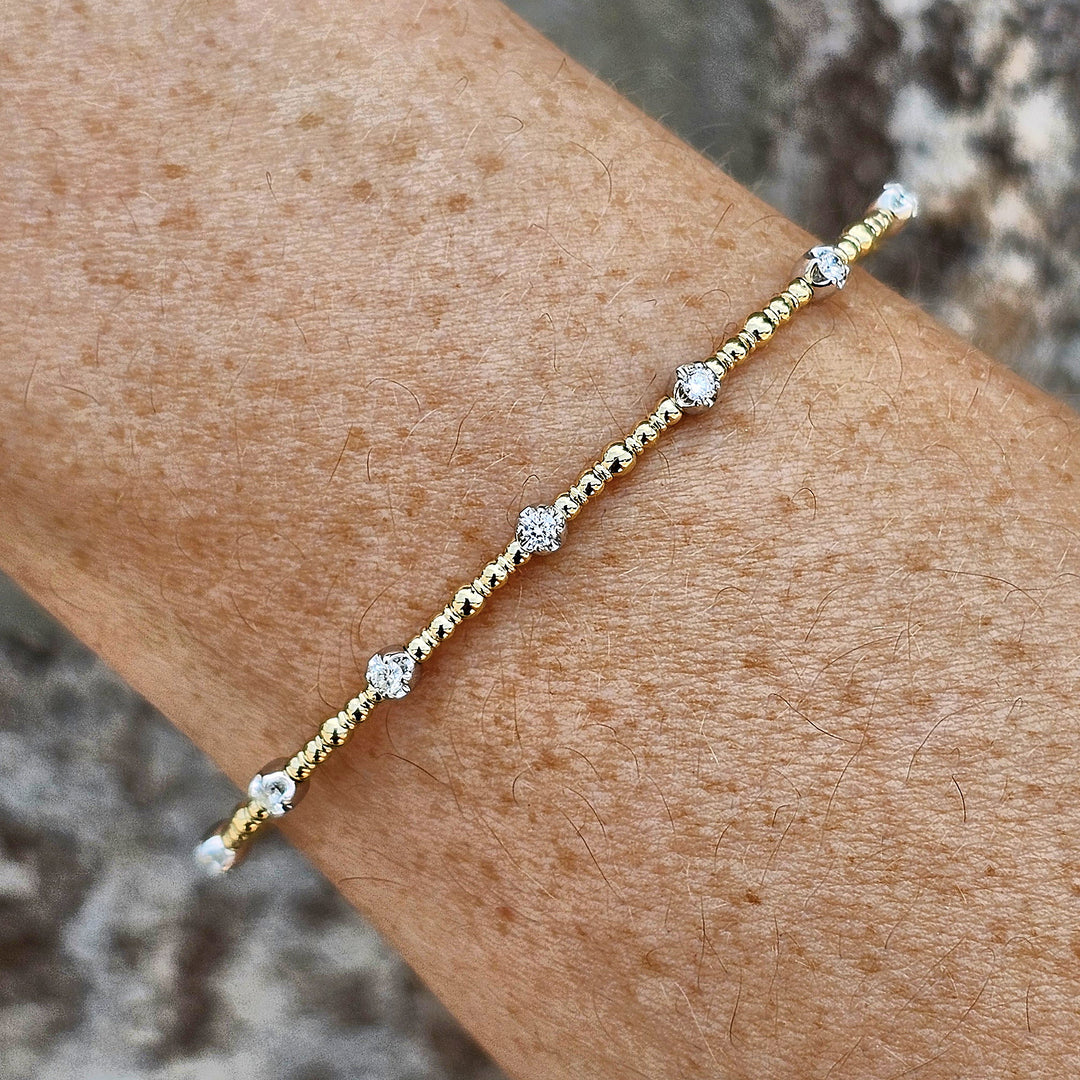 14k Two Tone 7 Station Diamond Flex Bangle .25ctw