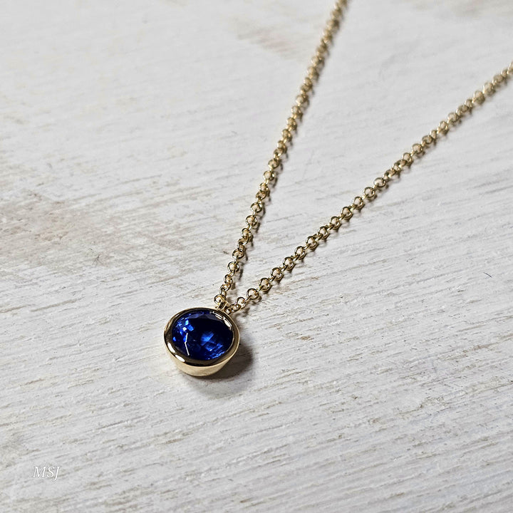 14k Yellow Gold .73ct Blue Sapphire Solitaire Pendant