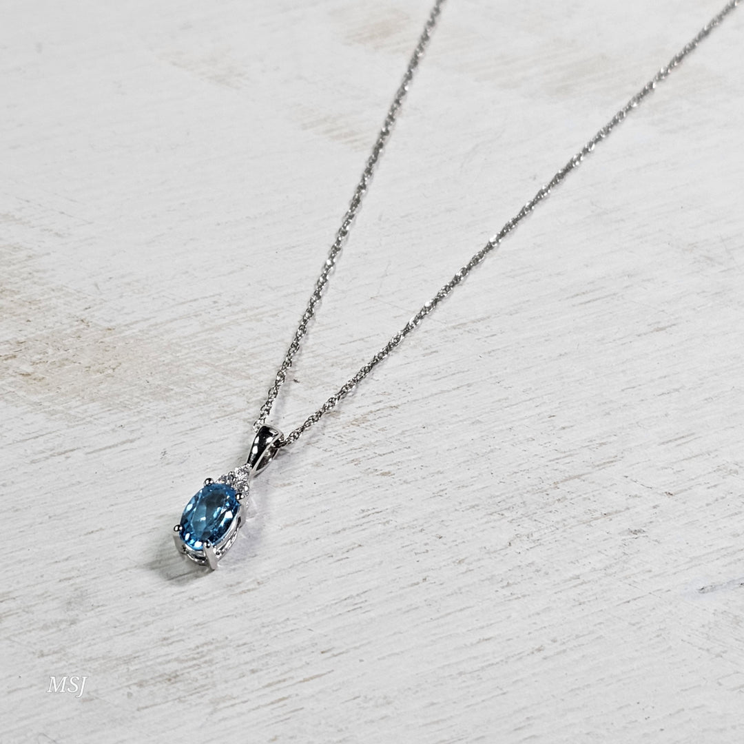 10k White Gold .41ctw Blue Topaz and Diamond Pendant