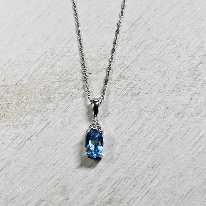10k White Gold .41ctw Blue Topaz and Diamond Pendant
