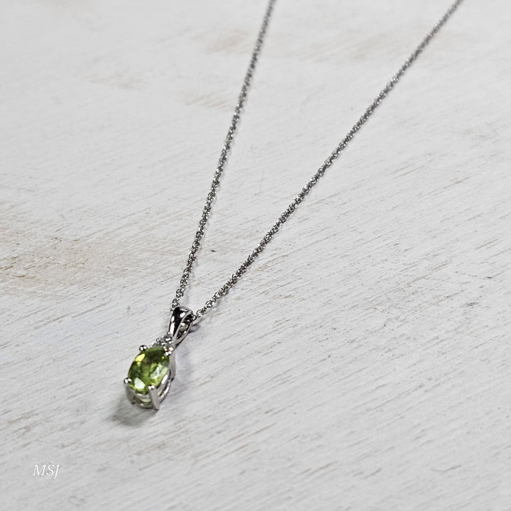 10k White Gold .53ctw Peridot and Diamond Pendant