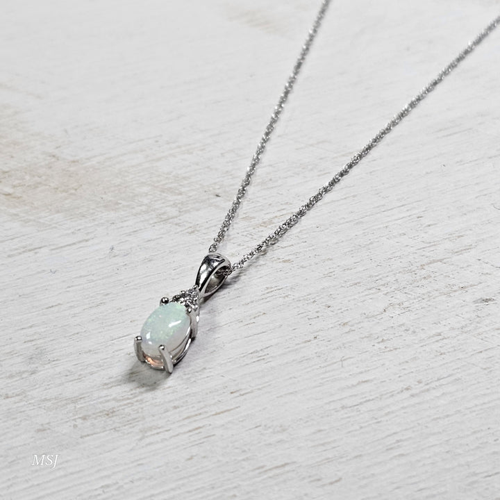 10k White Gold .66ctw Opal and Diamond Pendant