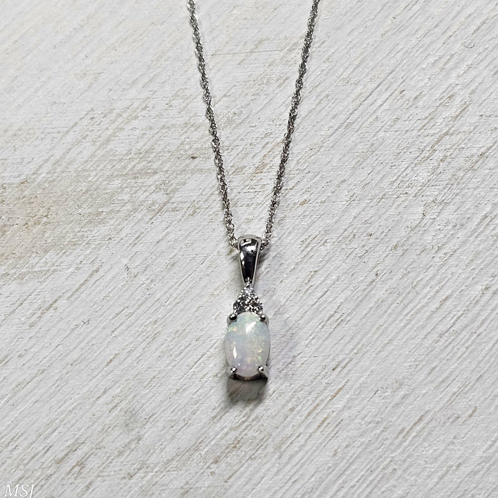 10k White Gold .66ctw Opal and Diamond Pendant