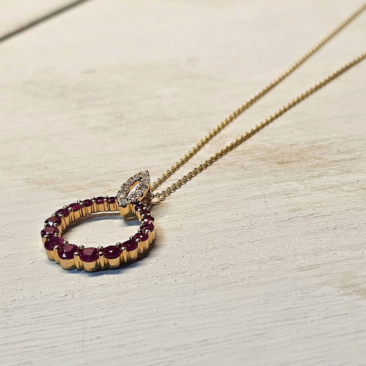 14k Yellow Gold Circle Graduated Ruby Pendant with Diamond Bail
