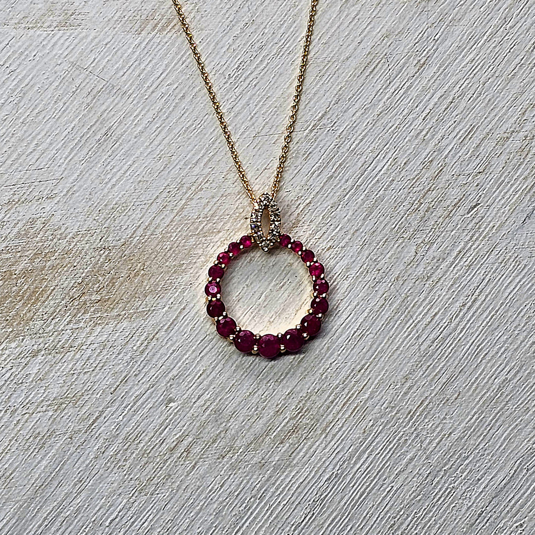 14k Yellow Gold Circle Graduated Ruby Pendant with Diamond Bail