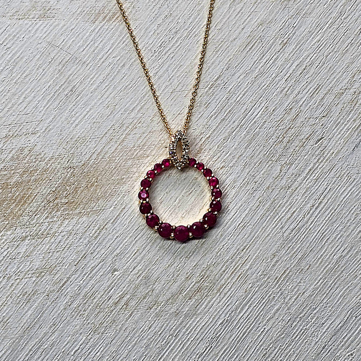 14k Yellow Gold Circle Graduated Ruby Pendant with Diamond Bail