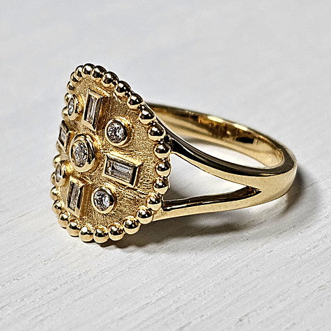 14k Yellow Gold 0.19 Ctw Round and Baguette Diamond Compass Style Ring